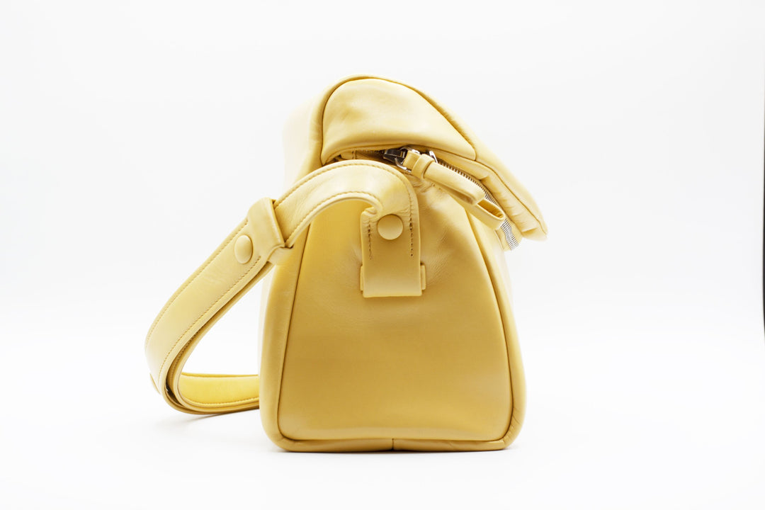 Prada Yellow Bag - Elegant Designer Handbag Made in Italy with Adjustable Strap and Secure Zip Closure