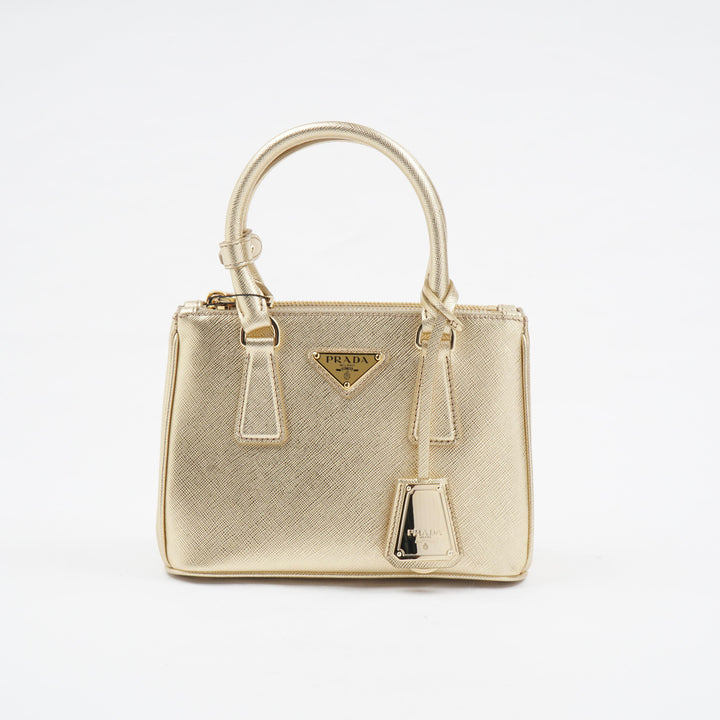 Prada Golden Handbag with Iconic Logo