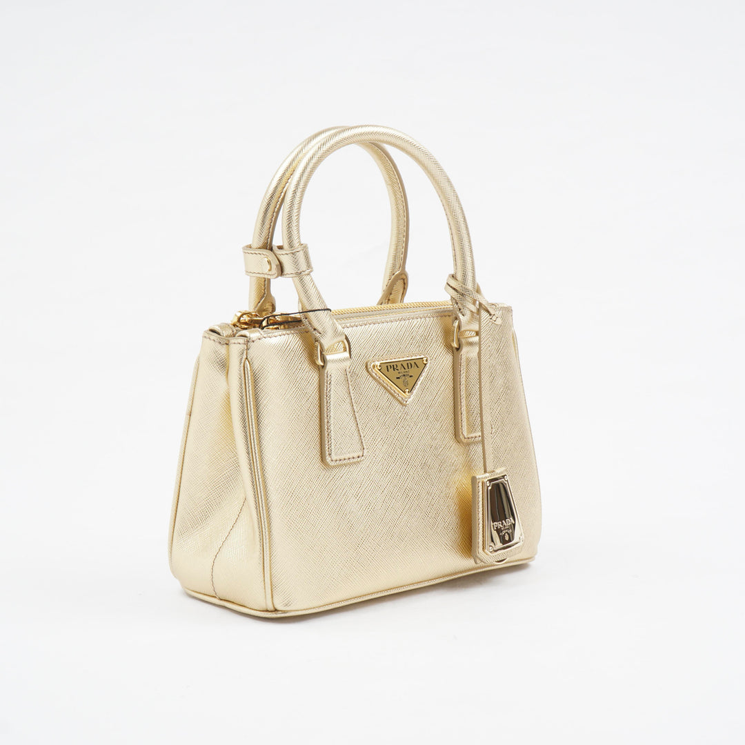 Prada Golden Handbag with Iconic Logo