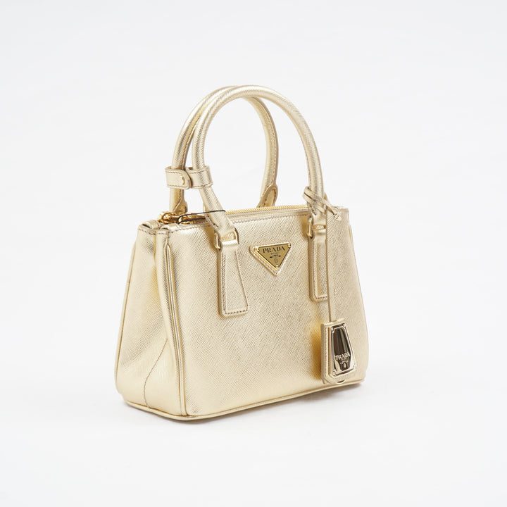 Prada Golden Handbag with Iconic Logo