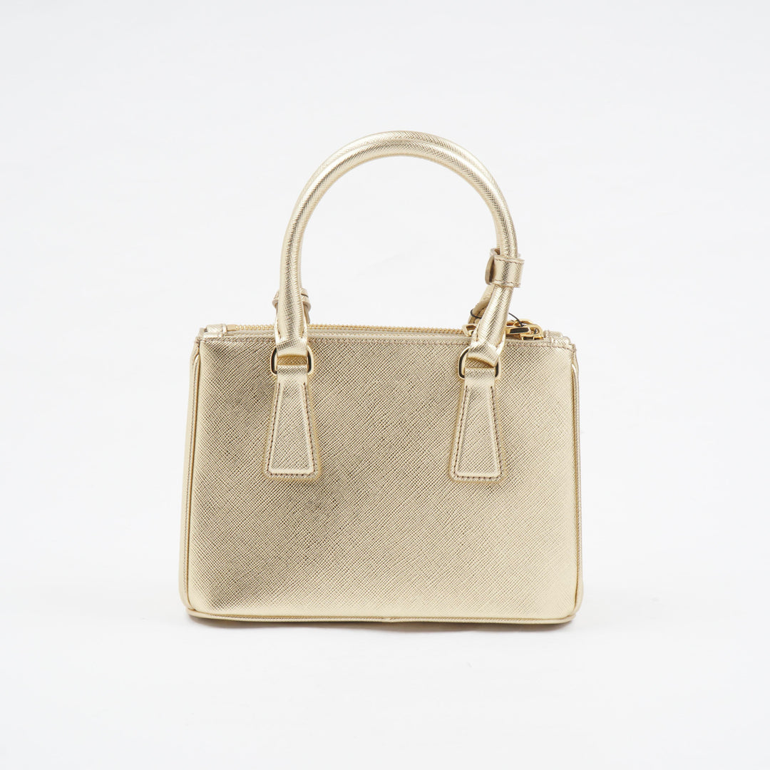 Prada Golden Handbag with Iconic Logo