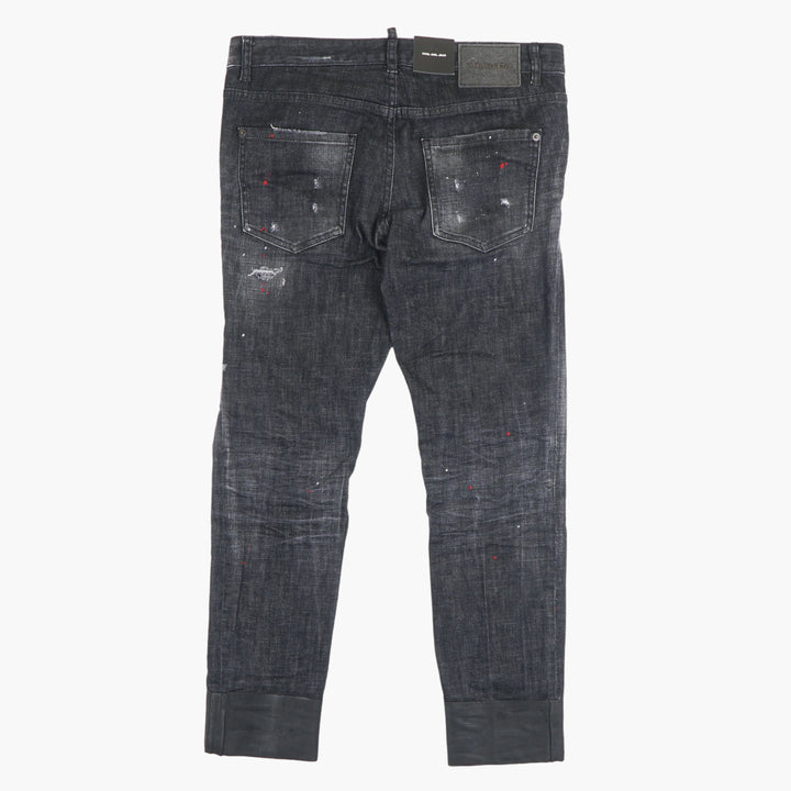 Jeans slim fit in denim nero consumato DSQUARED2 con dettagli a schizzi di vernice