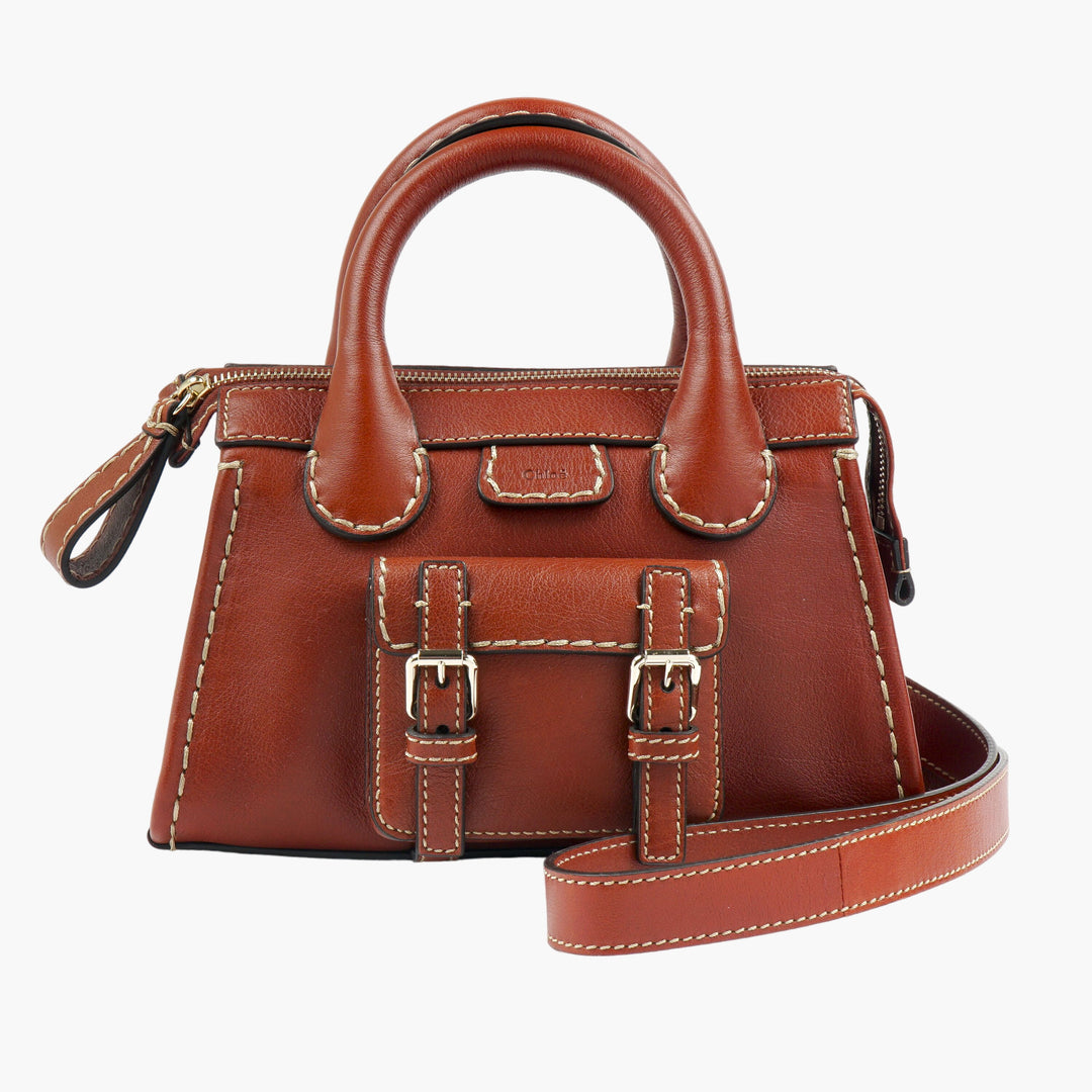 Chloè Brown Leather Bag with Adjustable Shoulder Strap and Buckled Accents