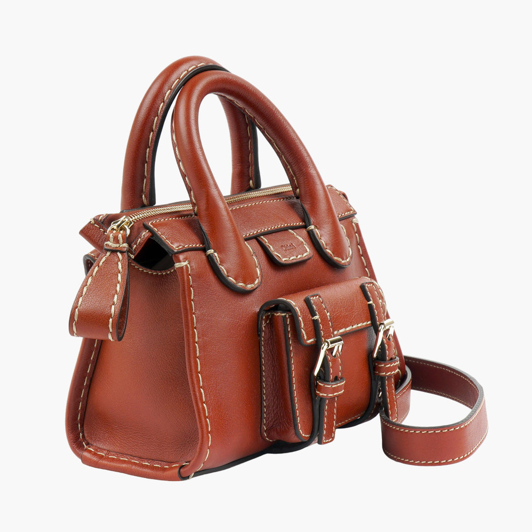 Chloè Brown Leather Bag with Adjustable Shoulder Strap and Buckled Accents