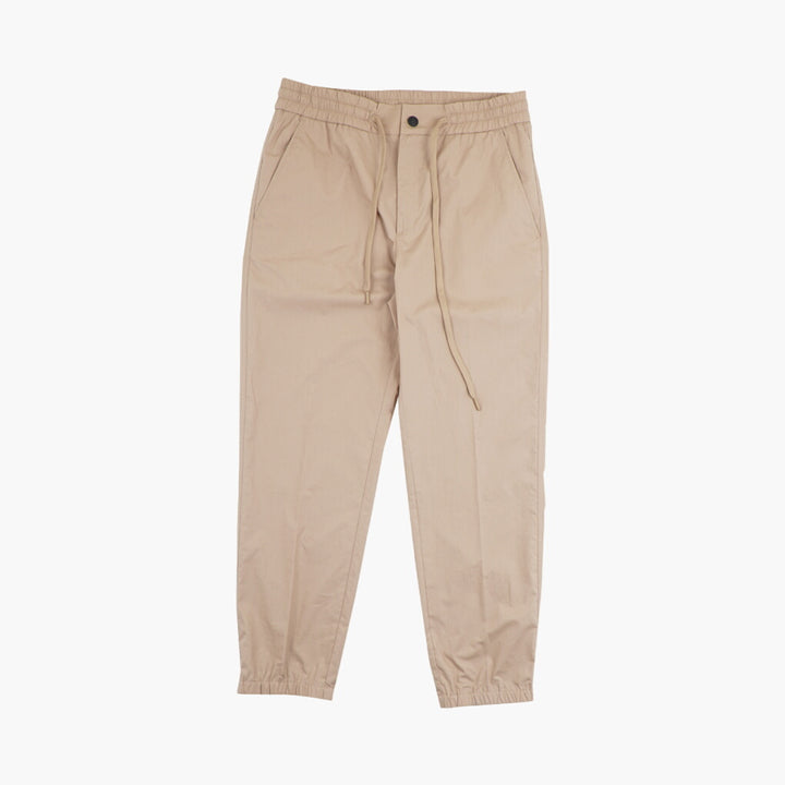 Stylish Beige-Black Versace Trousers With Elastic Waistband for Comfort and Durability