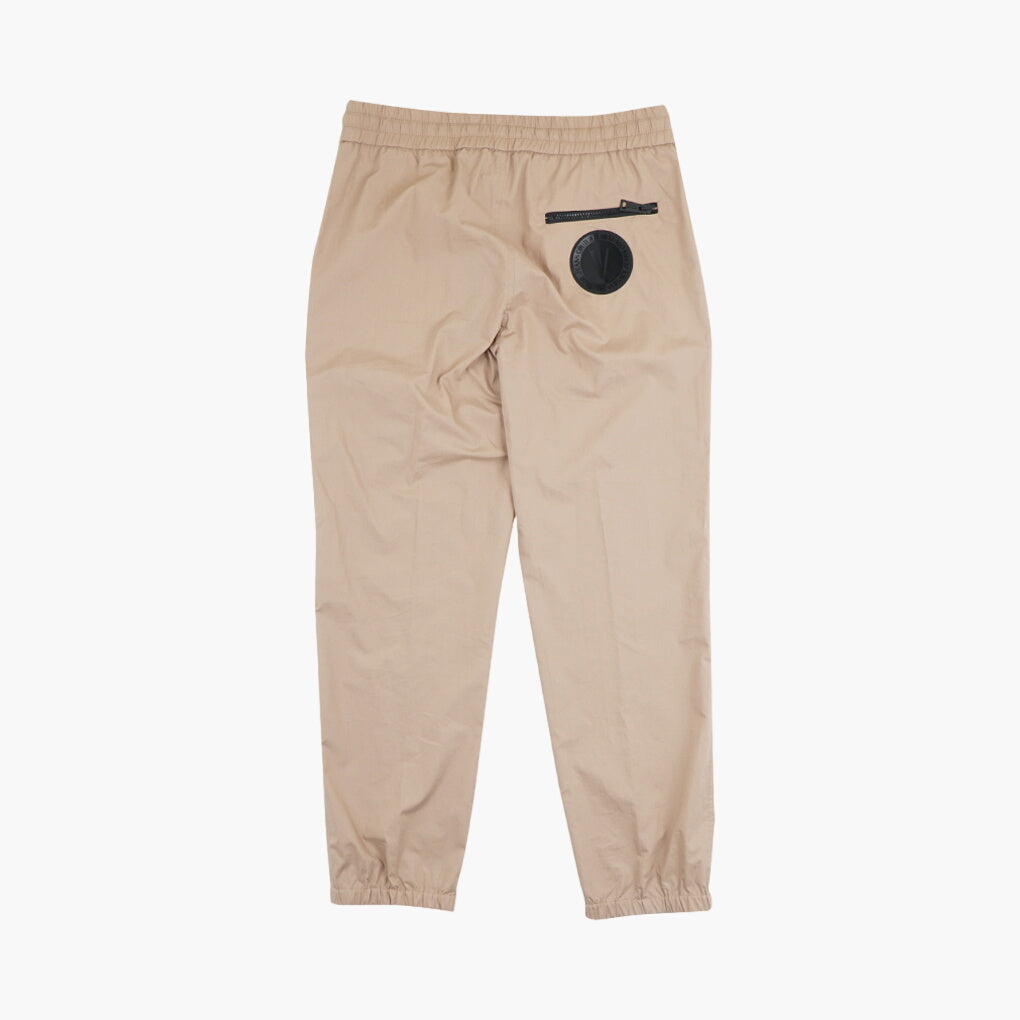 Stylish Beige-Black Versace Trousers With Elastic Waistband for Comfort and Durability