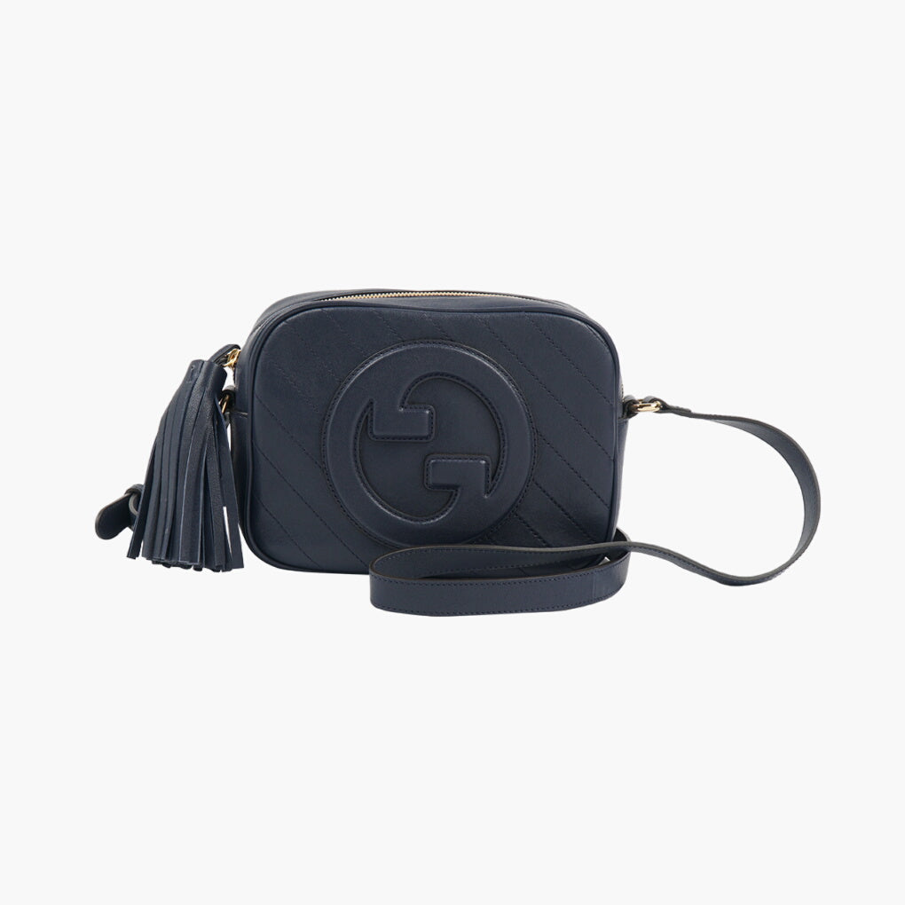 Gucci Navy-Gold Bag with Iconic Tassel Accent