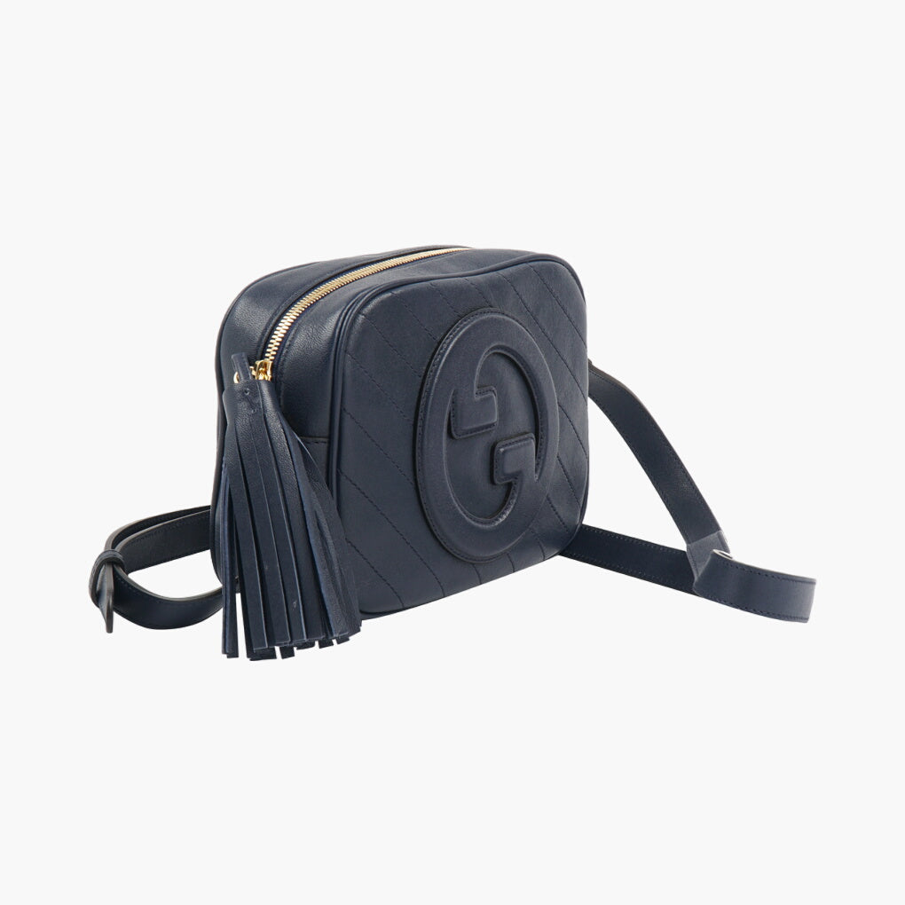 Gucci Navy-Gold Bag with Iconic Tassel Accent