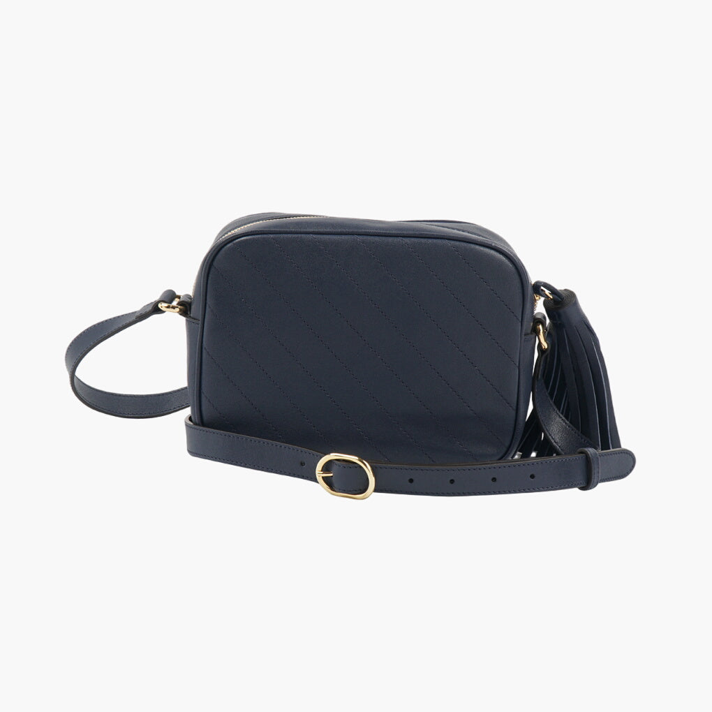 Gucci Navy-Gold Bag with Iconic Tassel Accent