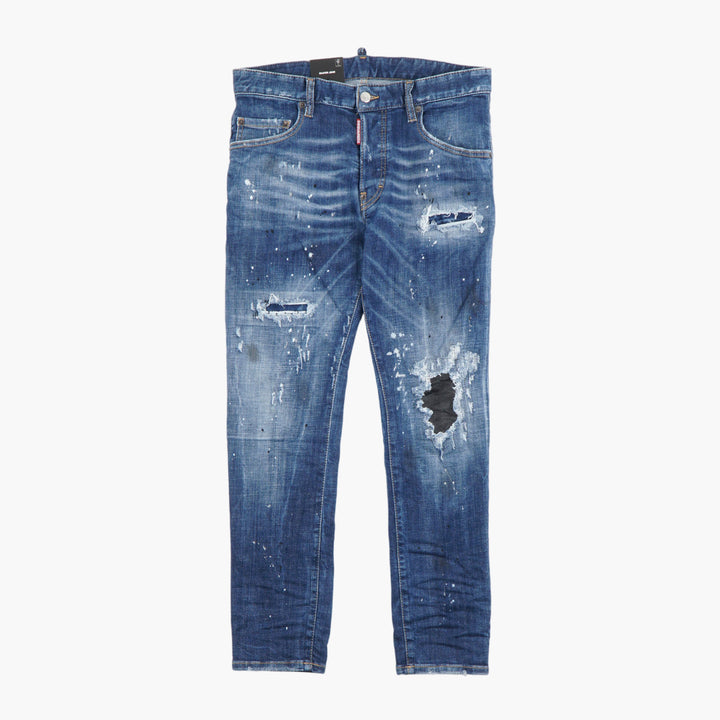 Jeans slim fit in denim DSQUARED2 con macchie di vernice rovinate