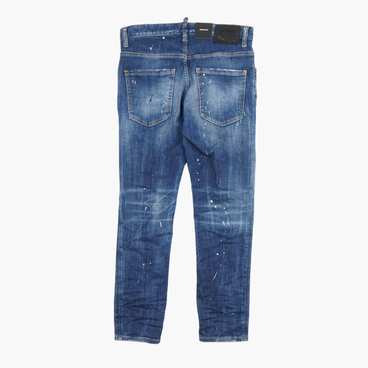 Jeans slim fit in denim DSQUARED2 con macchie di vernice rovinate