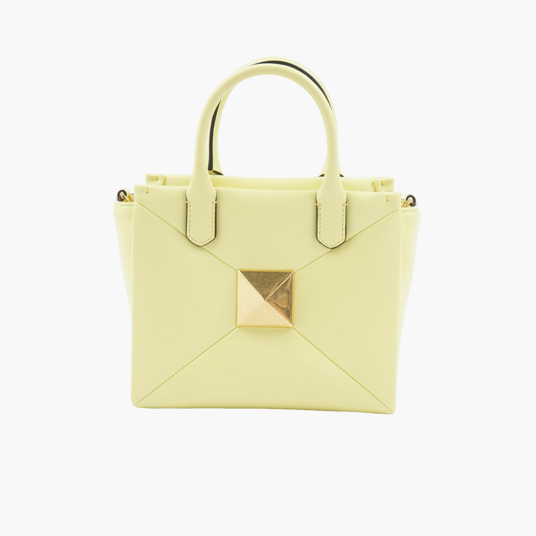 VALENTINO Borsa a mano di lusso in oro giallo con dettagli in borchie color oro, realizzata in Italia