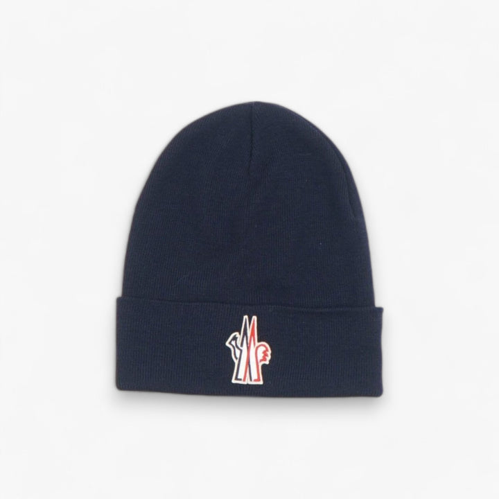 Cappello in lana blu navy Moncler con logo iconico