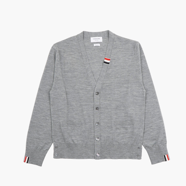 Cardigan grigio Thom Browne con dettagli tricolore