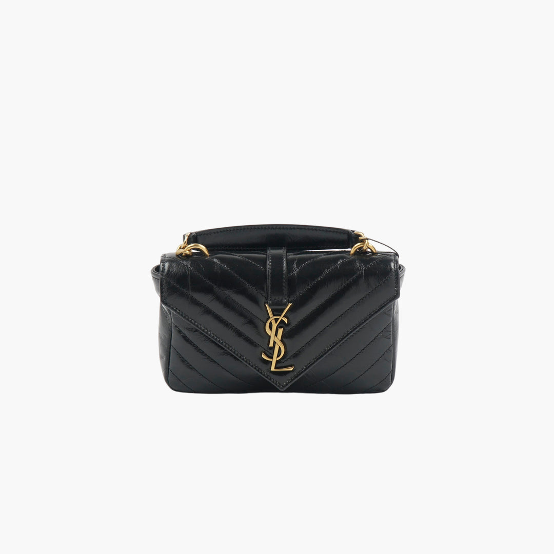 SAINT LAURENT Black-Gold Quilted Leather Bag with Iconic YSL Logo