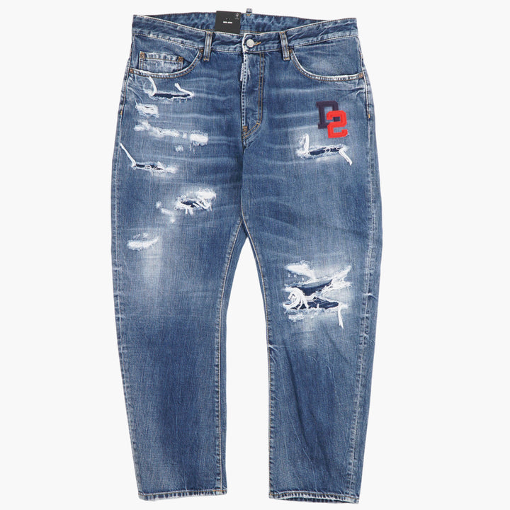 Jeans in denim usurati DSQUARED2 con logo iconico in elegante lavaggio blu