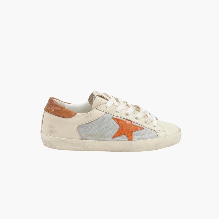 Golden Goose Women's Distressed Look Sneakers with Star Detail in Dirty White-Orange